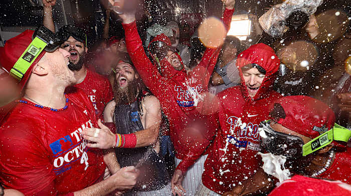 Phillies celebrate wild card series win over Marlins.